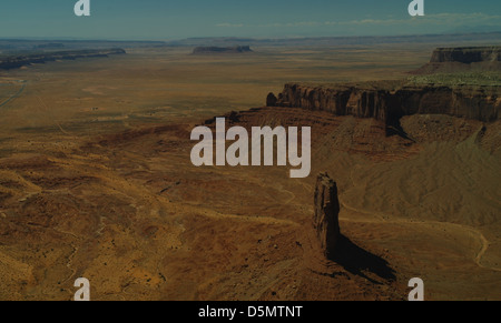 Aerial view, north to Oljeto Mesa, Train Rock, Ute Mountain, West Mitten rising sides Sentinel Mesa, Monument Valley, Arizona Stock Photo