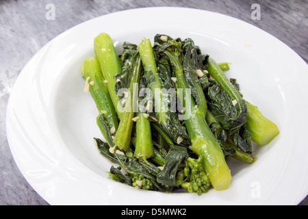Chinese Kailan Green Vegetables Steamed with Garlic and Oil Stock Photo