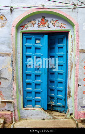 ancient blue wooden door in Varanasi city,India Stock Photo