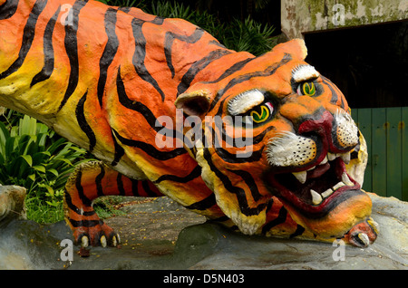 Striped Bengal tiger with green eyes Stock Photo