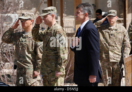 US Commander Lt. Col. John Chong, left, Air Force Maj. Gen. Harry Polumbo Jr., center and Ambassador Stephen McFarland during the closing ceremony of Provincial Reconstruction Team Gardez April 3, 2013 in Gardez, Afghanistan. A PRT is a military and civilian assistance program for rebuilding and stabilizing the local government. The closing was the first PRT to shut in Afghanistan after being established in January 2003 as the US winds down in Afghanistan. Stock Photo