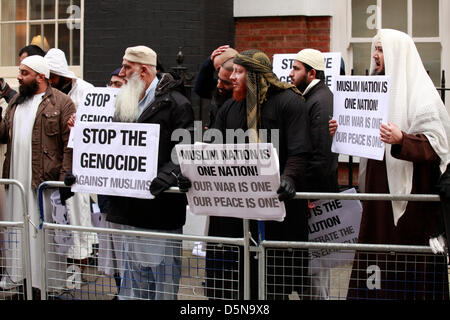 London, UK. 5th April 2013. Muslim demonstration against Burmese and Sri Lankan aggression took place at Hyde Park Gardens (Sri Lanka Embassy) and Charles Street (Burmese Embassy). Protesters were making themselves heard while holding banners against the genocide and the aggression towards the Muslims. Credit: Lydia Pagoni / Alamy Live News Stock Photo