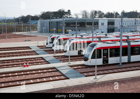 Edinburgh Trams sit at the Gogar depot waiting to be released on to the network. Stock Photo