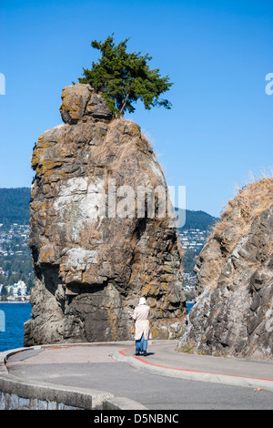 Siwash rock in Stanley Park. Vancouver, British Columbia, Canada Stock Photo