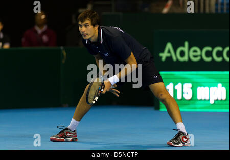 Coventry, UK. 5th April 2013.  Russia's Evgeny Donskoy playing against Great Britain's James Ward during the Euro/Africa Zone Group I Davis Cup tie between Great Britain and Russia from the Ricoh Arena. Credit: Action Plus Sports Images / Alamy Live News Stock Photo