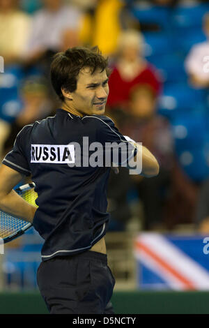 Coventry, UK. 5th April 2013.  Russia's Evgeny Donskoy playing against Great Britain's James Ward during the Euro/Africa Zone Group I Davis Cup tie between Great Britain and Russia from the Ricoh Arena. Credit: Action Plus Sports Images / Alamy Live News Stock Photo