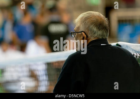 Coventry, UK. 5th April 2013.  Official checks the net during the Euro/Africa Zone Group I Davis Cup tie between Great Britain and Russia from the Ricoh Arena. Credit: Action Plus Sports Images / Alamy Live News Stock Photo