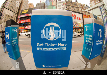 Select Bus Service kiosks seen in midtown in New York Stock Photo