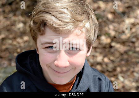 A teenage boy portrait outdoors. Stock Photo
