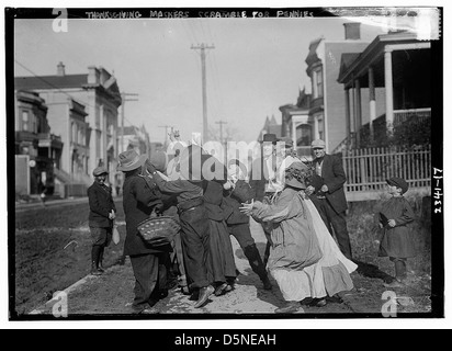 Thanksgiving Maskers scramble for pennies (LOC) Stock Photo