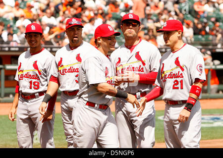 From left to right, St. Louis Cardinals' Albert Pujols, Tom Pagnozzi, Bob  Forsch, Bob Gibson and Red Schoendienst make the first pitches before the  Cardinals baseball game against the Philadelphia Phillies at