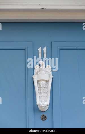 blue grey gray dusk mauve wooden timber front door white furniture knocker number numbers 11 1 eleven letter box house Stock Photo