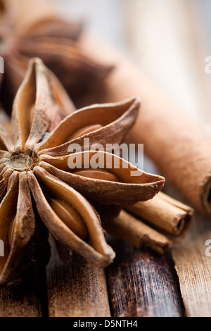 Star anis on brown background, shallow focus Stock Photo