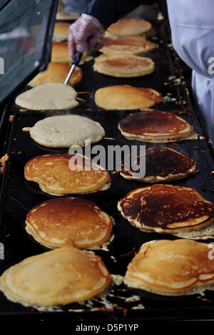 Elmira, Ontario, Canada. 6th April 2013. Elmira Maple Syrup Festival Elmira Ontario Canada  April 6 2013 Pancakes on grill. Performance Image / Alamy Live News Stock Photo