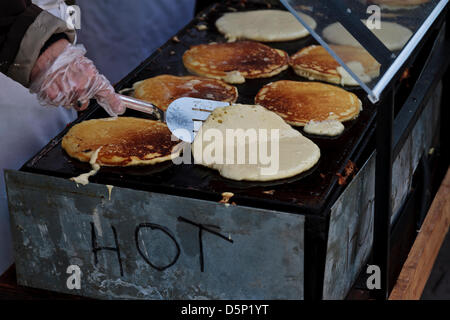 Elmira, Ontario, Canada. 6th April 2013. Elmira Maple Syrup Festival Elmira Ontario Canada  April 6 2013 Pancakes on grill. Performance Image / Alamy Live News Stock Photo