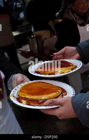 Elmira, Ontario, Canada. 6th April 2013. Elmira Maple Syrup Festival Elmira Ontario Canada  April 6 2013 Pancakes with Maple Syrup. Performance Image / Alamy Live News Stock Photo