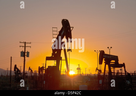 Oil pumps at sunset in California Stock Photo