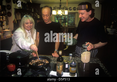 Dwina Gibb Robin Gibb at home with personal chef 2000s UK HOMER SYKES Stock Photo