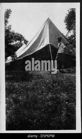 Helen Richey, a pioneering aviator, is shown standing outdoors in 1928 ...
