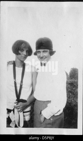 Helen Richey, a pioneering aviator, is seen outdoors in boots, jodhpurs ...