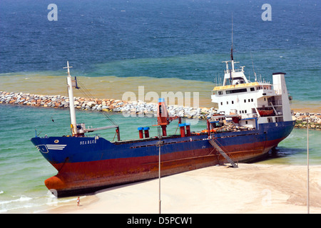 Coastal Freighter run aground on the Beach in Ajman, United Arab Emirates Stock Photo