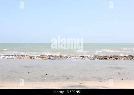 View of waves from the sea on beach,not Clean water is black because of the mud is mixed. Stock Photo