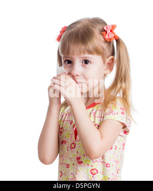 kid cleaning nose with tissue isolated on white Stock Photo