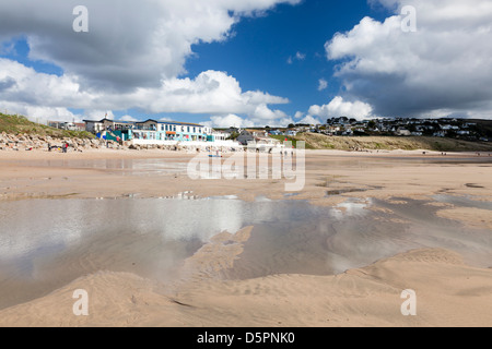 Beautiful sky reflected in pools of water on the beach at Praa Sands Cornwall England Stock Photo