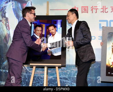 Beijing, China. 6th April, 2013. Robert Downey Jr. and Wang Xueqi at premiere of movie Iron Man 3 in Beijing, China on Saturday April 06, 2013. Stock Photo