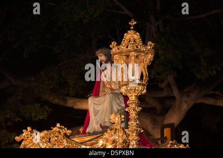 Christ in the procession 'Los Estudiantes' on Easter Monday in Semana Santa  in Málaga, Andalusia, Spain. Stock Photo