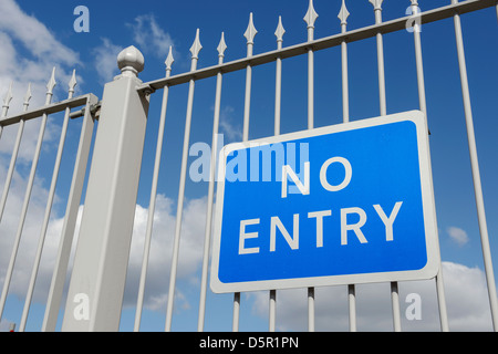 No Entry sign on metal railings Stock Photo