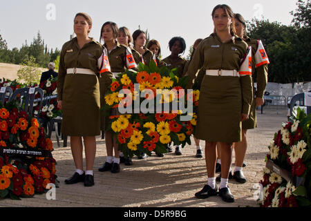 Jerusalem, Israel. 8th April 2013. IDF Military Policewomen prepare for the Wreath-Laying Ceremony commemorating Holocaust Martyrs' and Heroes' Remembrance Day. Jerusalem, Israel. 8-Apr-2013.  President Shimon Peres, Prime Minister Benjamin Netanyahu, US Secretary of State John Kerry, dignitaries and survivors took part in a Wreath-Laying Ceremony on Holocaust Martyrs' and Heroes' Remembrance Day in the Warsaw Ghetto Square at Yad-Vashem. Credit: Nir Alon / Alamy Live News Stock Photo