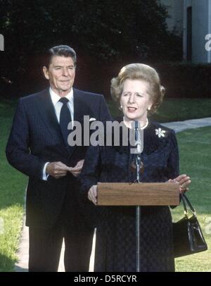 File pics: Prime Minister Margaret Thatcher of the United Kingdom, right, makes remarks as United States President Ronald Reagan looks on following their meeting at the White House in Washington, D.C. on Wednesday, June 23, 1982. Thatcher died from a stroke at 87 on Monday, April 8, 2013. Credit: Howard L. Sachs - CNP/Alamy Live News Stock Photo