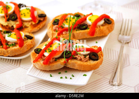 Bruschettas with tuna and peppers. Recipe available. Stock Photo