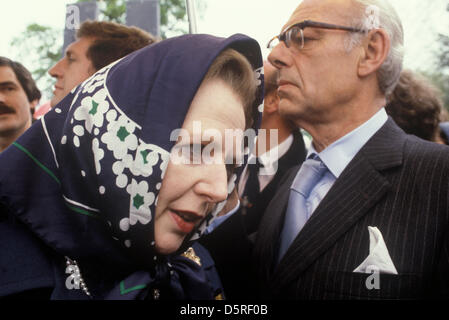 Archive: Margaret Thatcher died today 8th April 2013. Mrs Thatcher Denis Thatcher. Conservative party election campaign 1983. Midlands UK. Her body guard (in profile, out of focus)  behind her looking to left of image. Credit: Homer Sykes Stock Photo