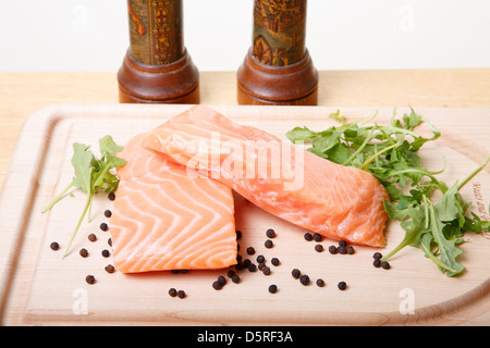 Fresh raw Atlantic salmon being prepared Stock Photo