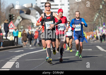 Berlin, Germany. 7th April, 2013. Participants  of the thirty-third  half marathon at km 14, 2013  in Berlin, Germany. Stock Photo