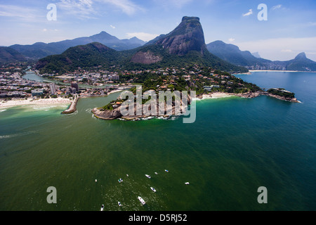 Morro da Joatinga and Joa upscale neighborhood upper class mansions Rio de Janeiro Barra da Tijuca beach and Quebra mar at left Stock Photo