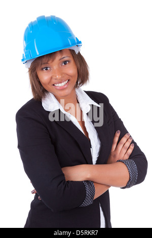 Confident Black African American woman architect smiling with folded arms, isolated on white background Stock Photo