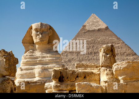 The Great Sphinx with the Pyramid of Khafre behind at Giza in Egypt Stock Photo