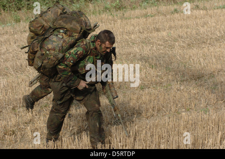 sniper, l115a3, long range rifle ,7. 62mm ,bullet,.sharp shooter sniper sharpshooter ,camouflage, suit ,soldiers, gun, firing ,s Stock Photo