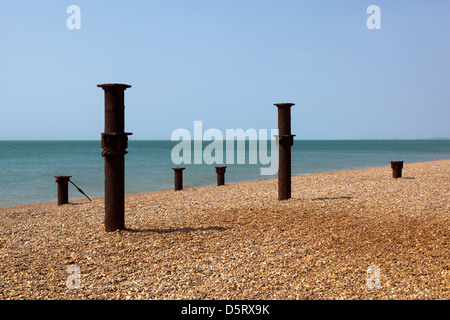 Old Stanchions of the West Pier at Brighton Beach Stock Photo