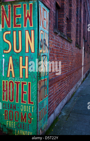 Corner sign for a very low-cost hotel in Chinatown, Vancouver Stock Photo