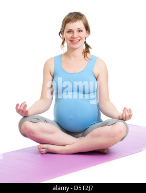 Pregnant woman doing yoga isolated on white Stock Photo