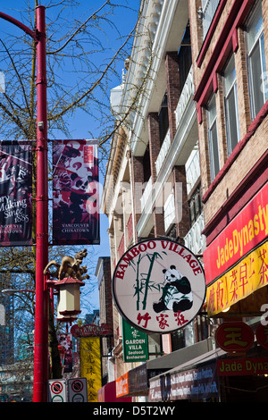 Banners and signs in Chinatown, Vancouver, Canada Stock Photo
