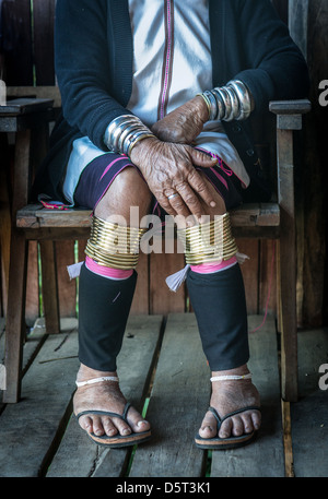 Long Neck Woman's hands and feet. Stock Photo