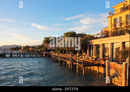Sunset view of the jetty port in Sirmione on Lago di Garda, Italy. Stock Photo
