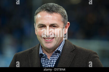 Wolfsburg's new manager Klaus Allofs is pictured before the German Bundesliga match between TSG 1899 Hoffenheim and VfL Wolfsburg at Rhein-Neckar-Arena in Sinsheim, Germany, 18 November 2012. Photo: UWE ANSPACH  (ATTENTION: EMBARGO CONDITIONS! The DFL permits the further utilisation of up to 15 pictures only (no sequntial pictures or video-similar series of pictures allowed) via th Stock Photo