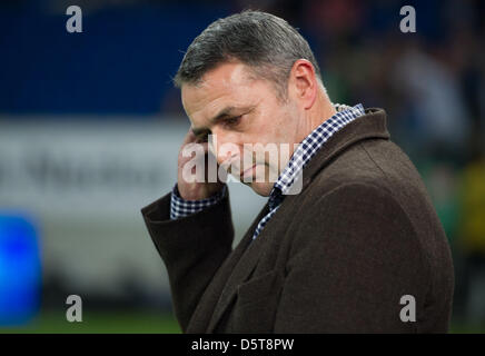 Wolfsburg's new manager Klaus Allofs seen before the German Bundesliga match between TSG 1899 Hoffenheim and VfL Wolfsburg at Rhein-Neckar-Arena in Sinsheim, Germany, 18 November 2012. Photo: UWE ANSPACH  (ATTENTION: EMBARGO CONDITIONS! The DFL permits the further utilisation of up to 15 pictures only (no sequntial pictures or video-similar series of pictures allowed) via the inter Stock Photo