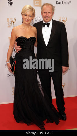 German actor Axel Milberg and his wife Judith arrive for the Bambi award ceremony 2012 in Duesseldorf, Germany, 22 November 2012. The Bambis are the main German media awards and are presented for the 64th time. Photo: Jörg Carstensen/dpa  +++(c) dpa - Bildfunk+++ Stock Photo